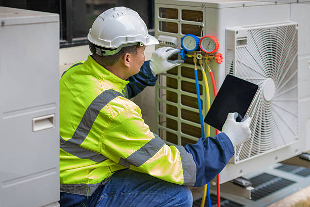 Professional Air Conditioning Repair technician working in Lake Luzerne, NY